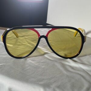 Gucci Black Aviator Sunglasses with Yellow Lenses